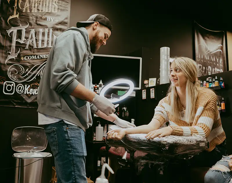 A Blackwater Ink artist tattooing a client inside the Niles, Ohio studio